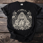 Black t-shirt with a graphic of a woman with wings, two lynx, and floral crescent moon details.