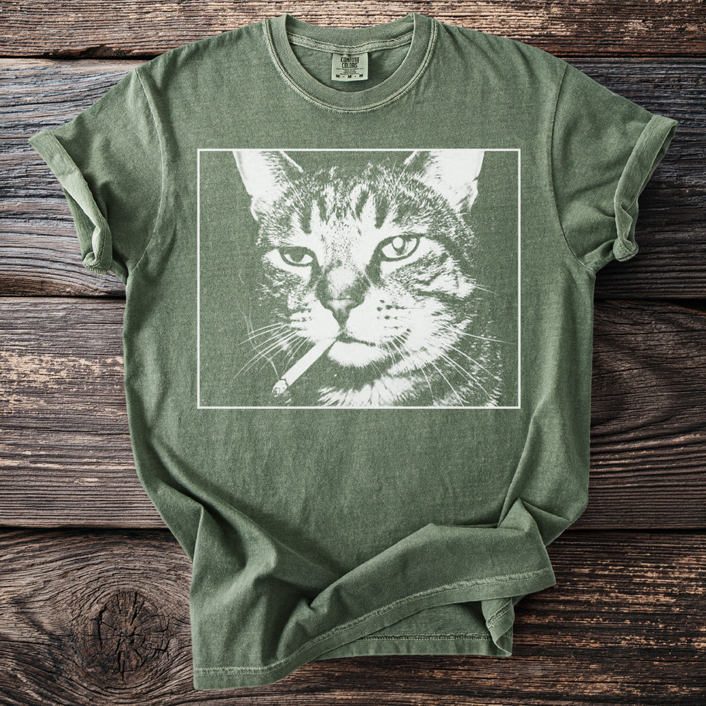 Green t-shirt with a graphic of a cat with a cigarette in its mouth.