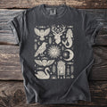 Dark grey t-shirt with a light beige graphic featuring celestial and mythical creatures.