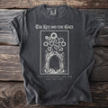 Dark t-shirt with graphic: The Key and the Gate, archway, and text.