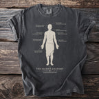 Dark grey t-shirt with "The Sacred Anatomy" anatomical diagram and body text.