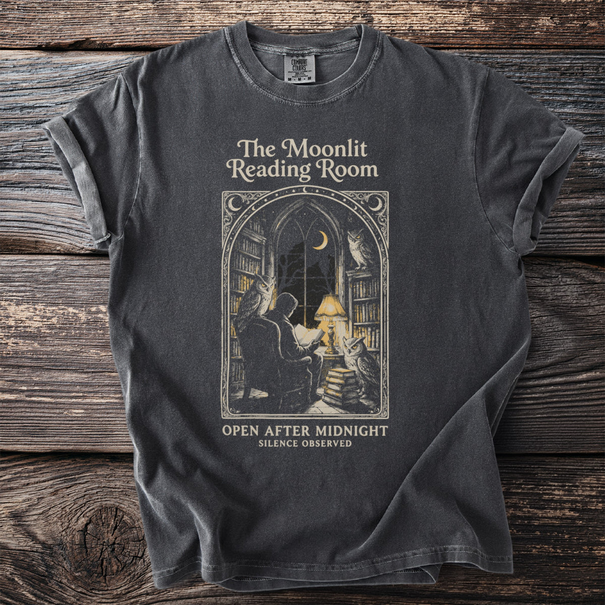 Dark t-shirt graphic: "The Moonlit Reading Room" with owls and a reader.