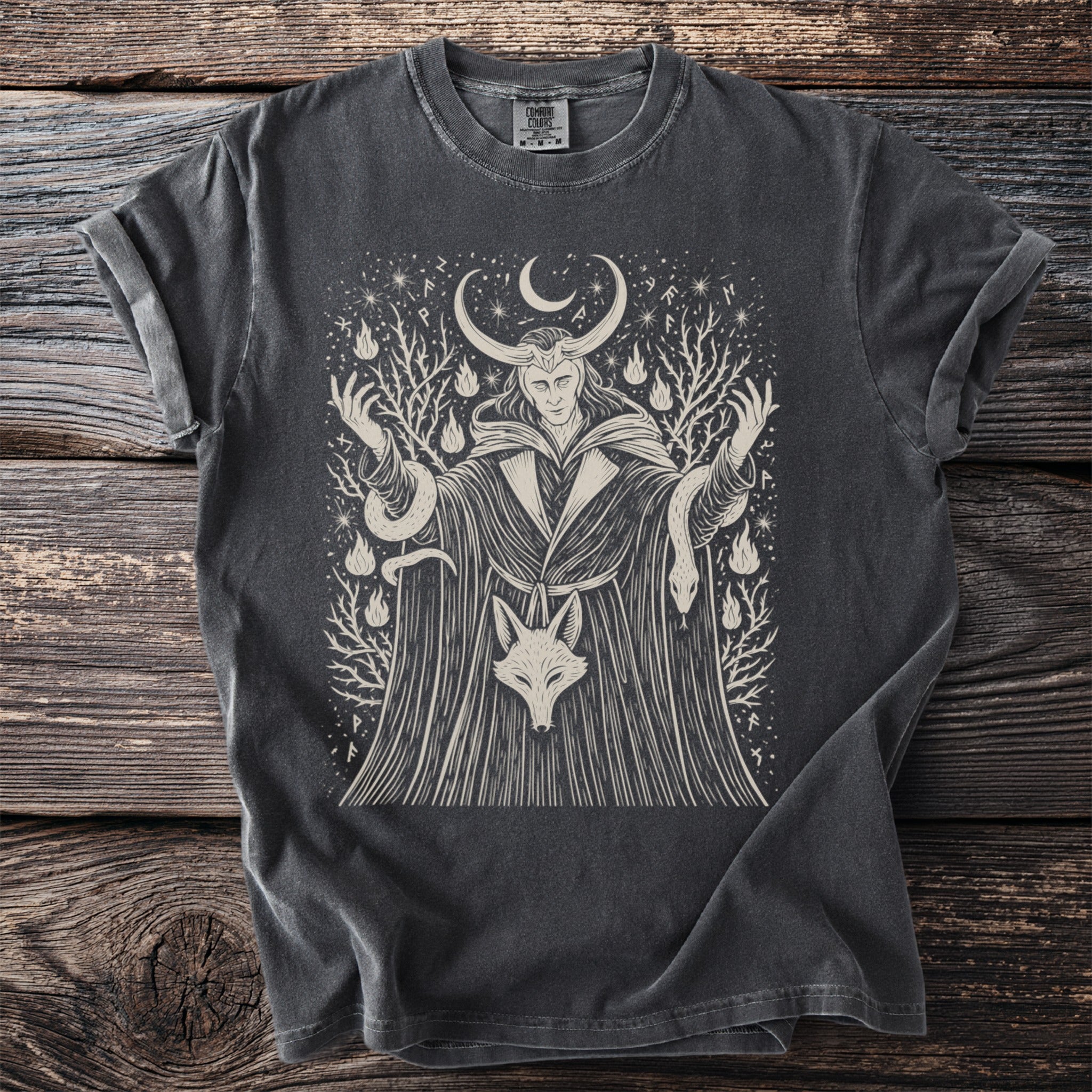 Dark gray t-shirt with mythological figure, snakes, fox, and runes graphic.