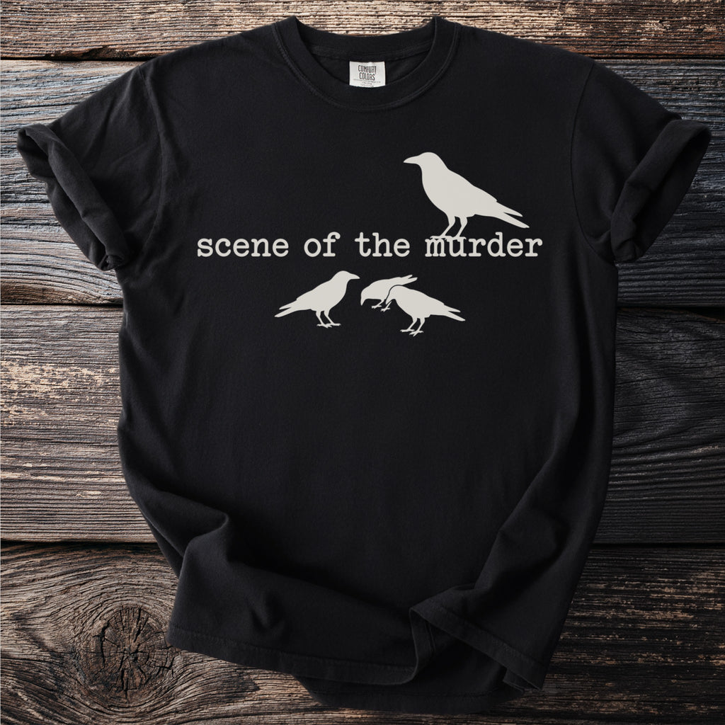 Black t-shirt with white crow silhouettes and "scene of the murder" text.