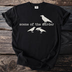 Black t-shirt with white crow silhouettes and "scene of the murder" text.