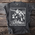 Dark grey t-shirt with werewolf watering plant graphic and "feral but functional" text.