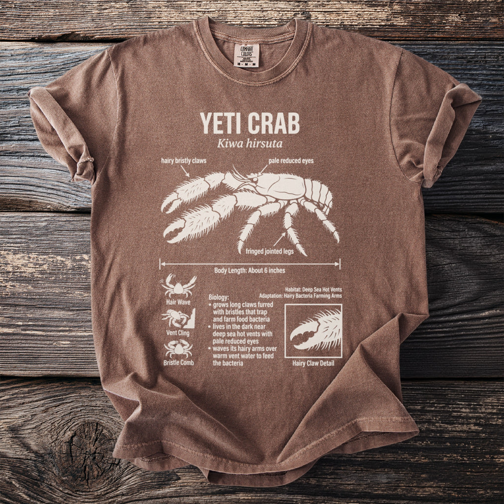 Brown t-shirt featuring a diagram of a yeti crab with labeled body parts and facts.