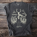 T-shirt with graphic of deer skull in tuxedo playing violin surrounded by moths and chairs.