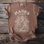 Brown shirt with "Hades Greek Mythology Underworld God" graphic and illustration.