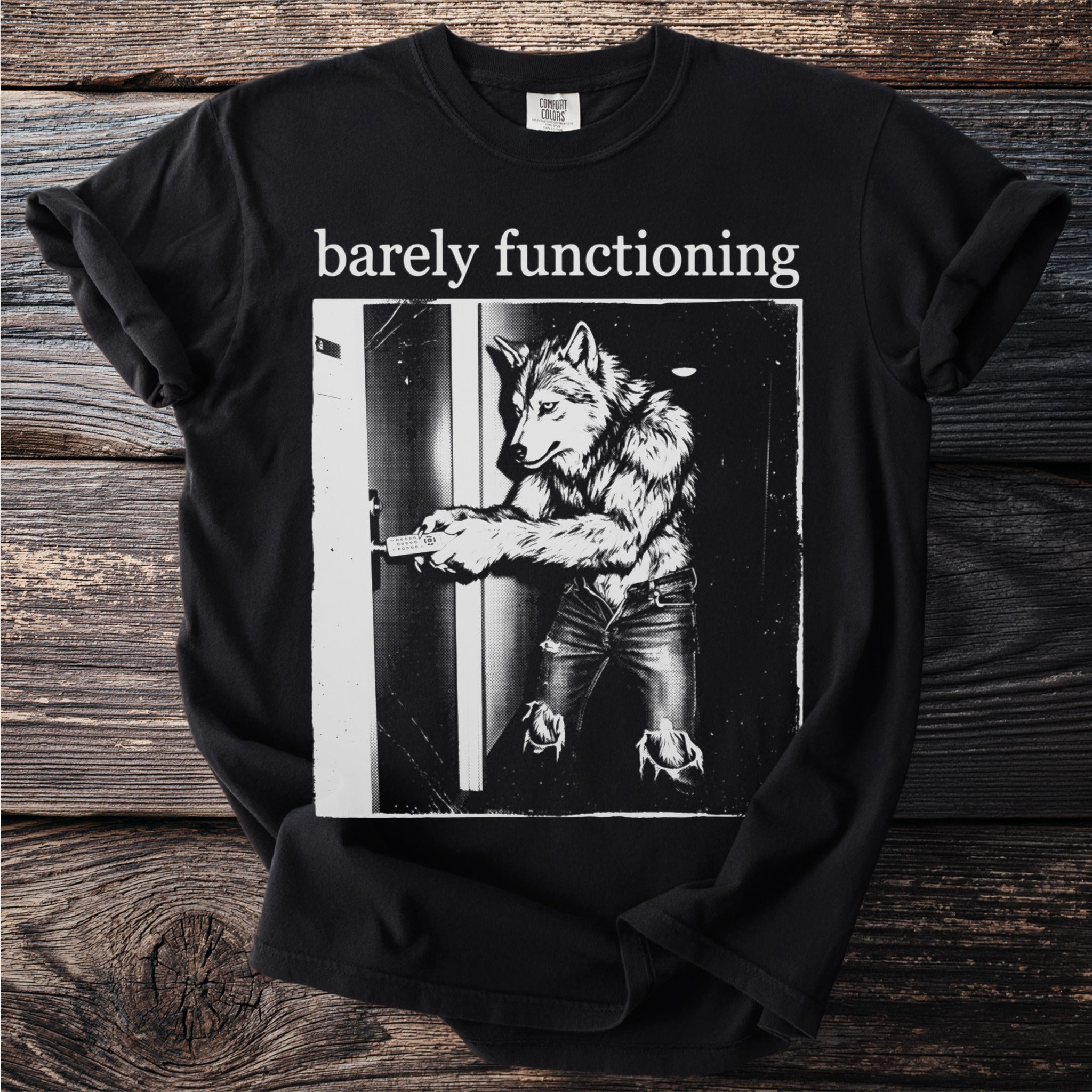 Black t-shirt with "barely functioning" text and wolf opening door graphic.