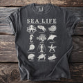 Dark grey t-shirt with "Sea Life" and an illustrated marine world chart.