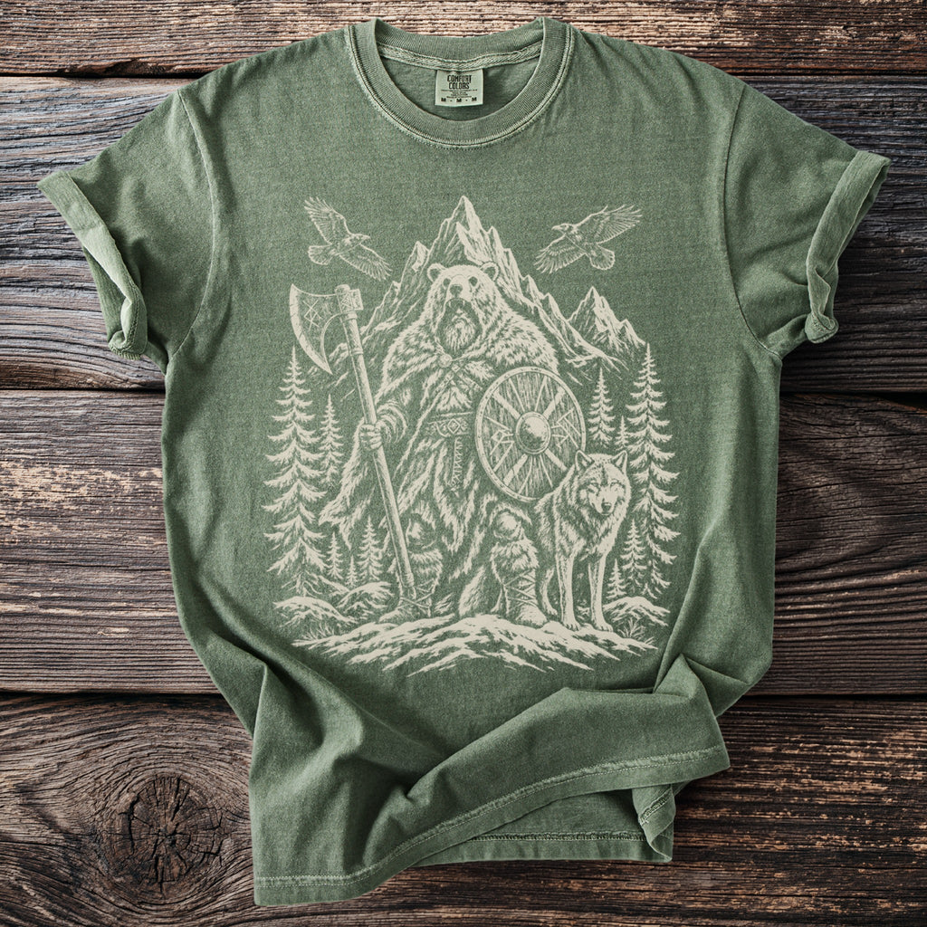 Green t-shirt with a Viking-inspired graphic of a bear, wolf, and forest.