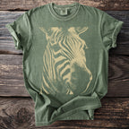 Green t-shirt with a vintage cream zebra head graphic and Comfort Colors label.