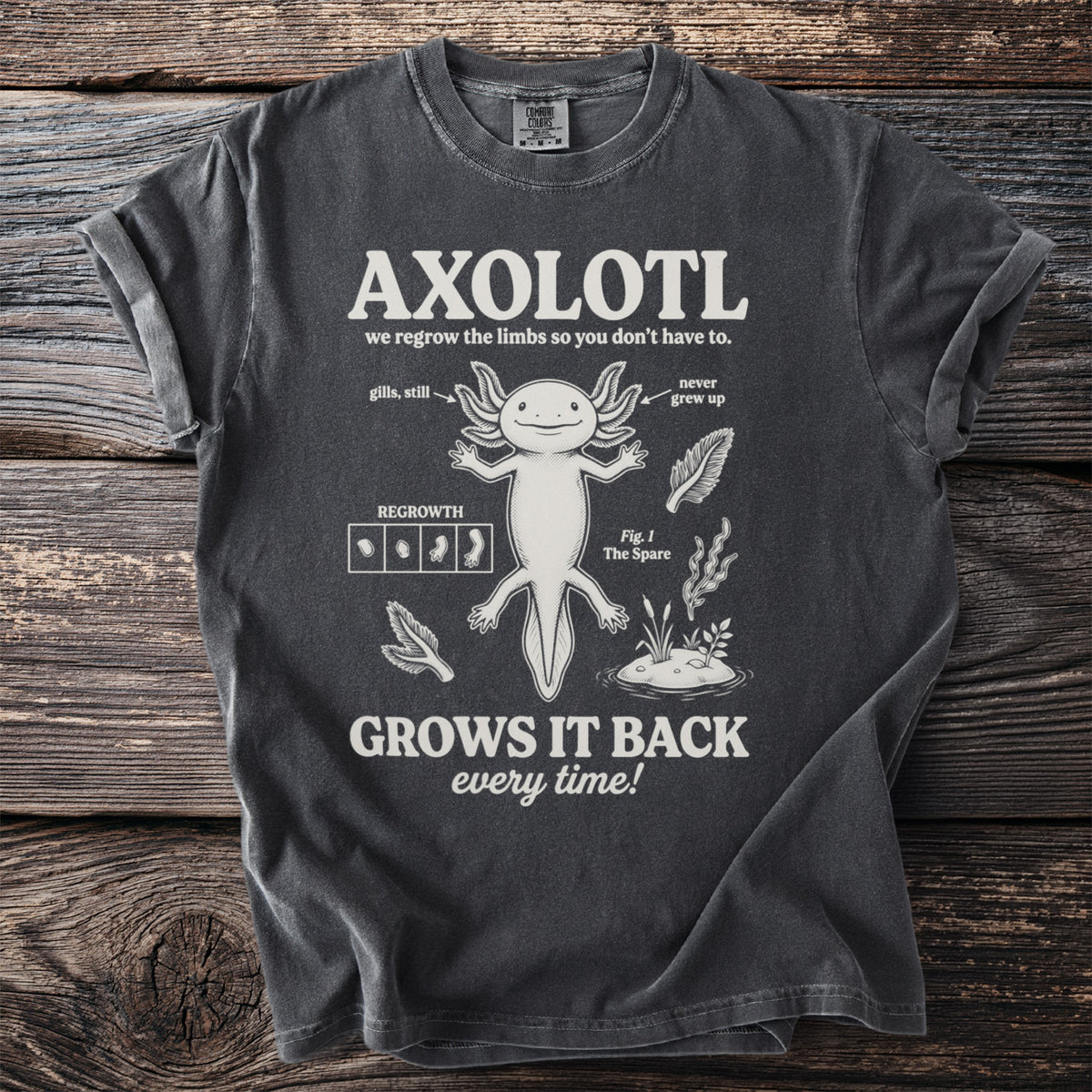 Dark t-shirt with axolotl graphic and text: "AXOLOTL GROWS IT BACK every time!"