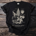 Black t-shirt with botanical illustrations of mosses, ferns, and lichen, titled "The Understory Cabinet".
