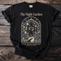 Black t-shirt with "The Night Garden" and an arched illustration of a greenhouse filled with plants.