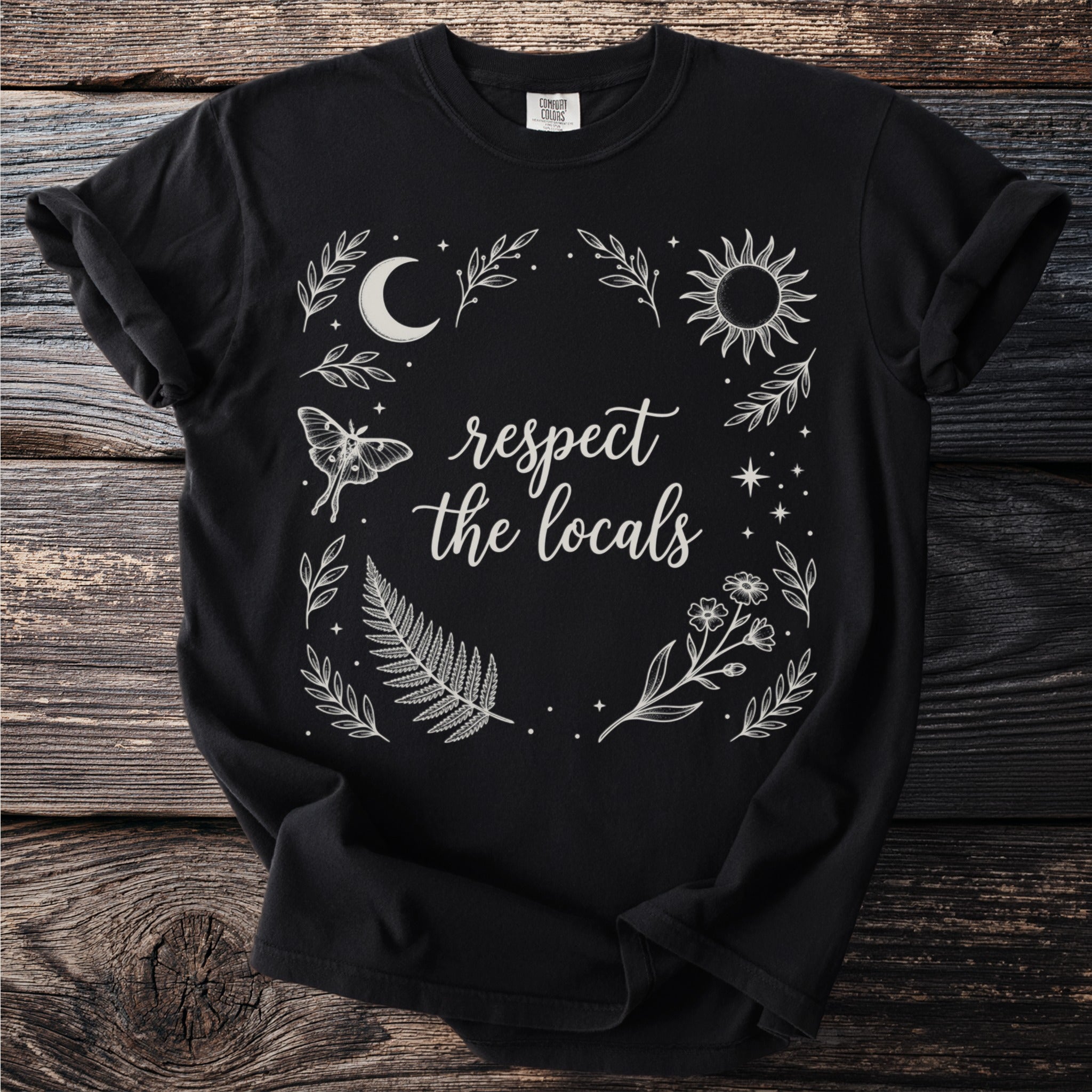 Black t-shirt with "respect the locals" graphic design featuring nature elements.
