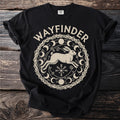 Black t-shirt with a cream "WAYFINDER" text and a leaping rabbit mandala.