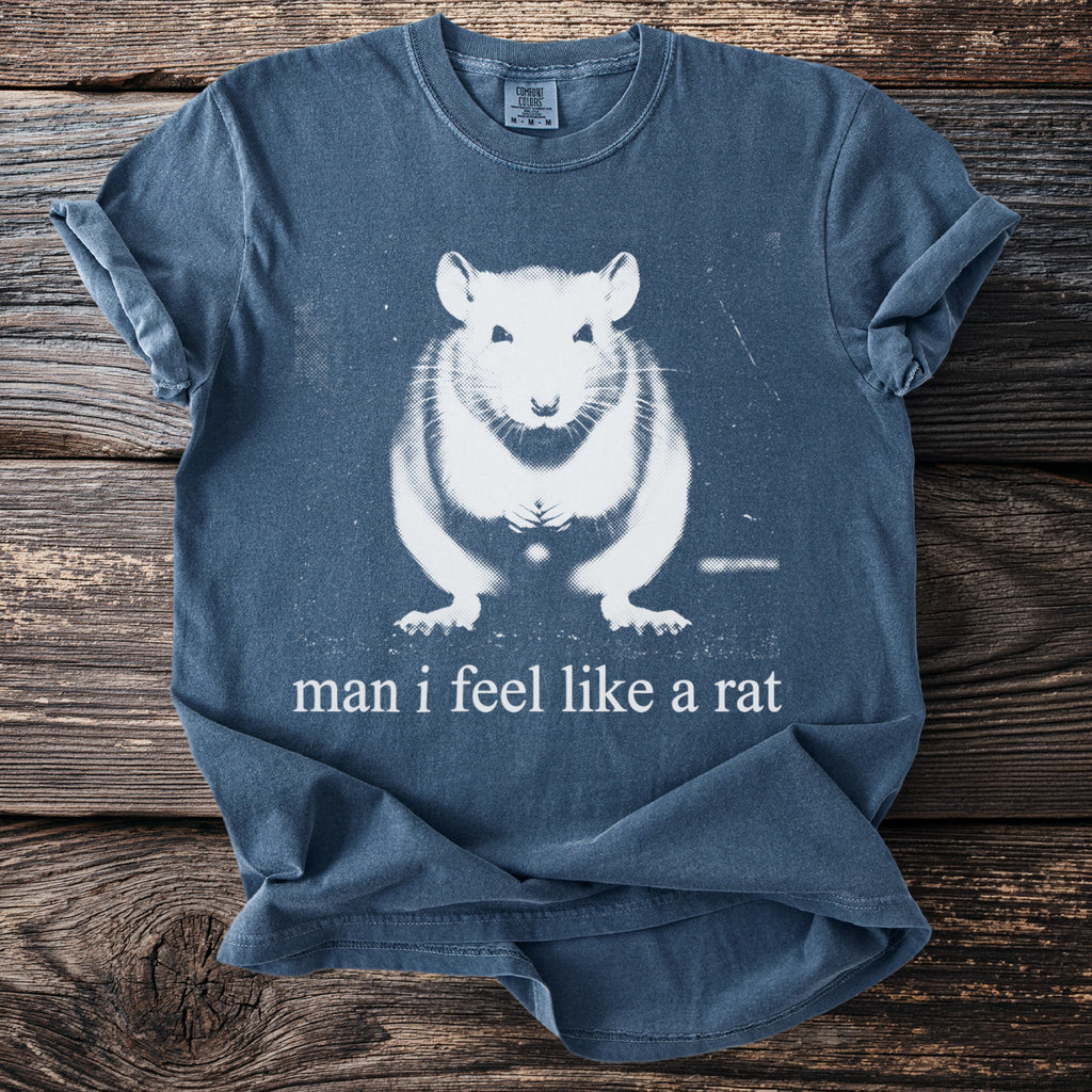 Blue t-shirt with white graphic of a rat and text "man i feel like a rat".