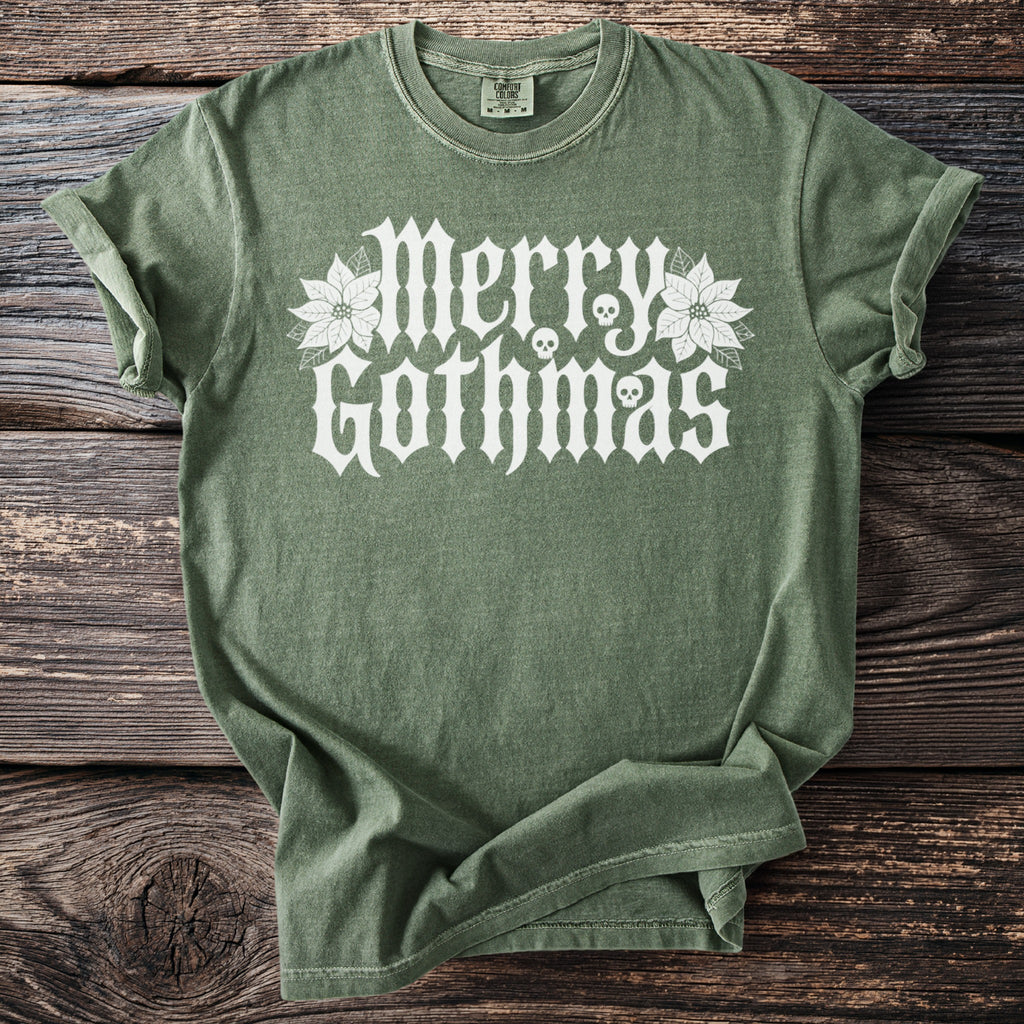 Green t-shirt with white "Merry Gothmas" text, skulls, and poinsettias.