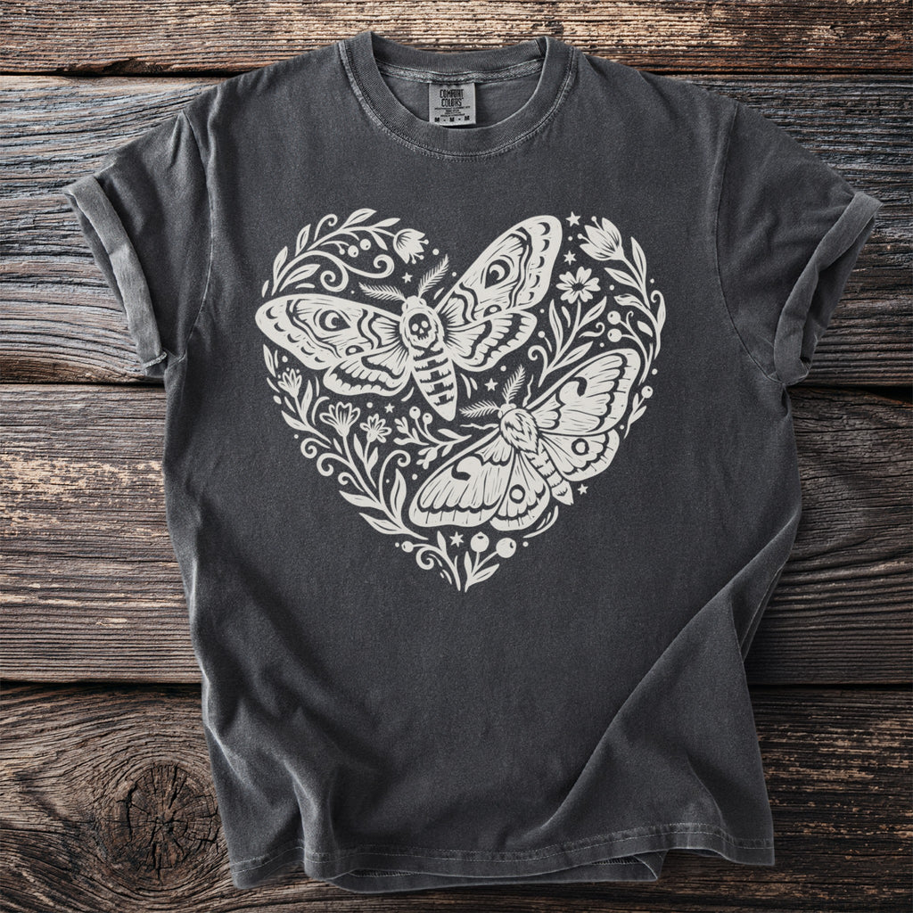 Dark grey t-shirt with white heart-shaped moth and floral print.