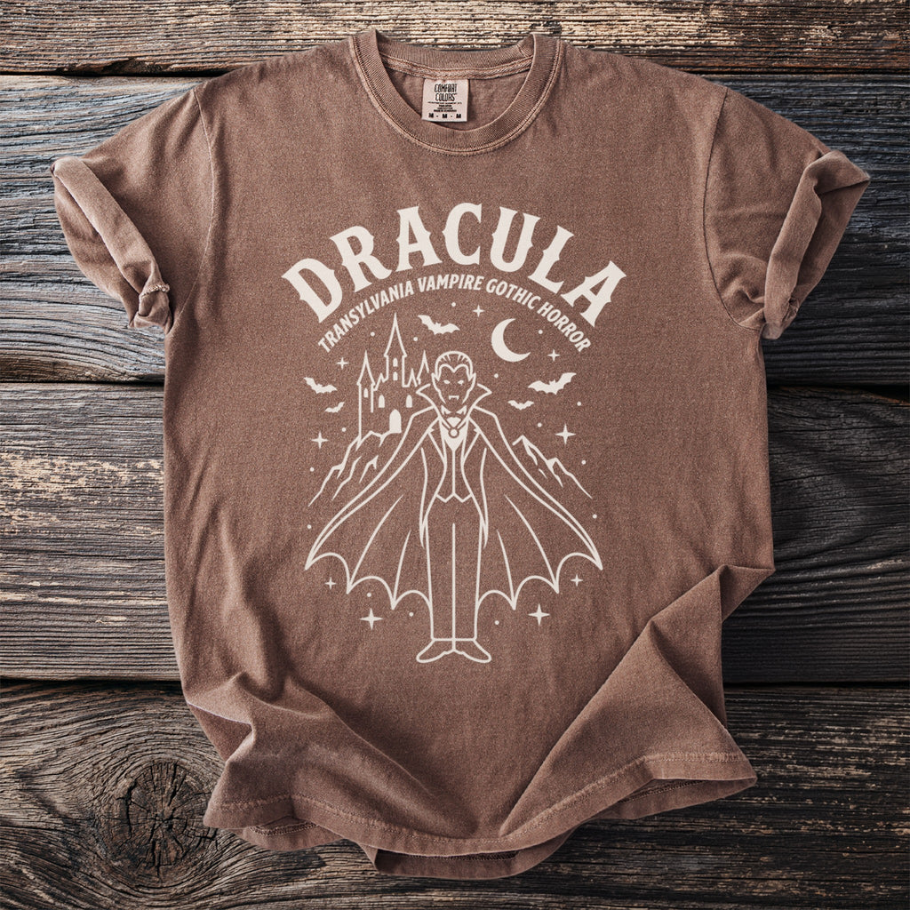 Brown t-shirt with Dracula, castle, bats, and moon graphic.