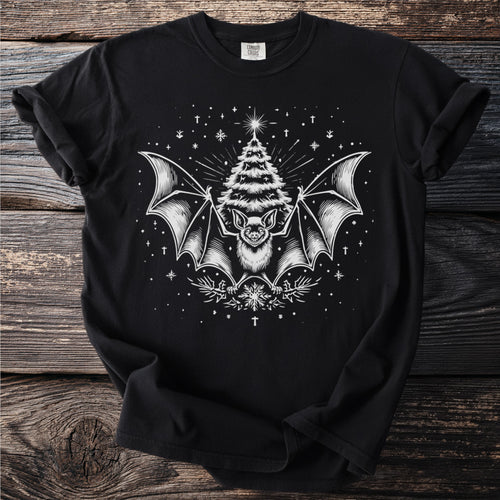 Black t-shirt with white bat, Christmas tree, and snowflake graphic.