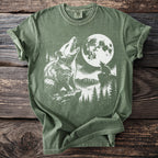 Green t-shirt with graphic of opossum and wolf howling at the moon.
