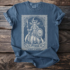 Blue t-shirt with a line drawing of a Valkyrie with shield, spear, and raven companions.