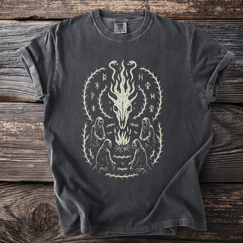 Dark gray t-shirt with a light-cream graphic of a skull, flames, and hooded figures.