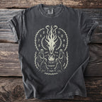 Dark gray t-shirt with a light-cream graphic of a skull, flames, and hooded figures.