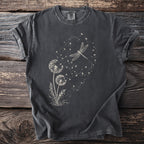 Dark t-shirt with white dragonfly and dandelion seed graphic.
