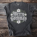 Dark gray t-shirt with "Merry Gothmas" text, skulls, and poinsettias.
