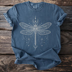Blue t-shirt with a detailed white celestial dragonfly design and moon and star accents.
