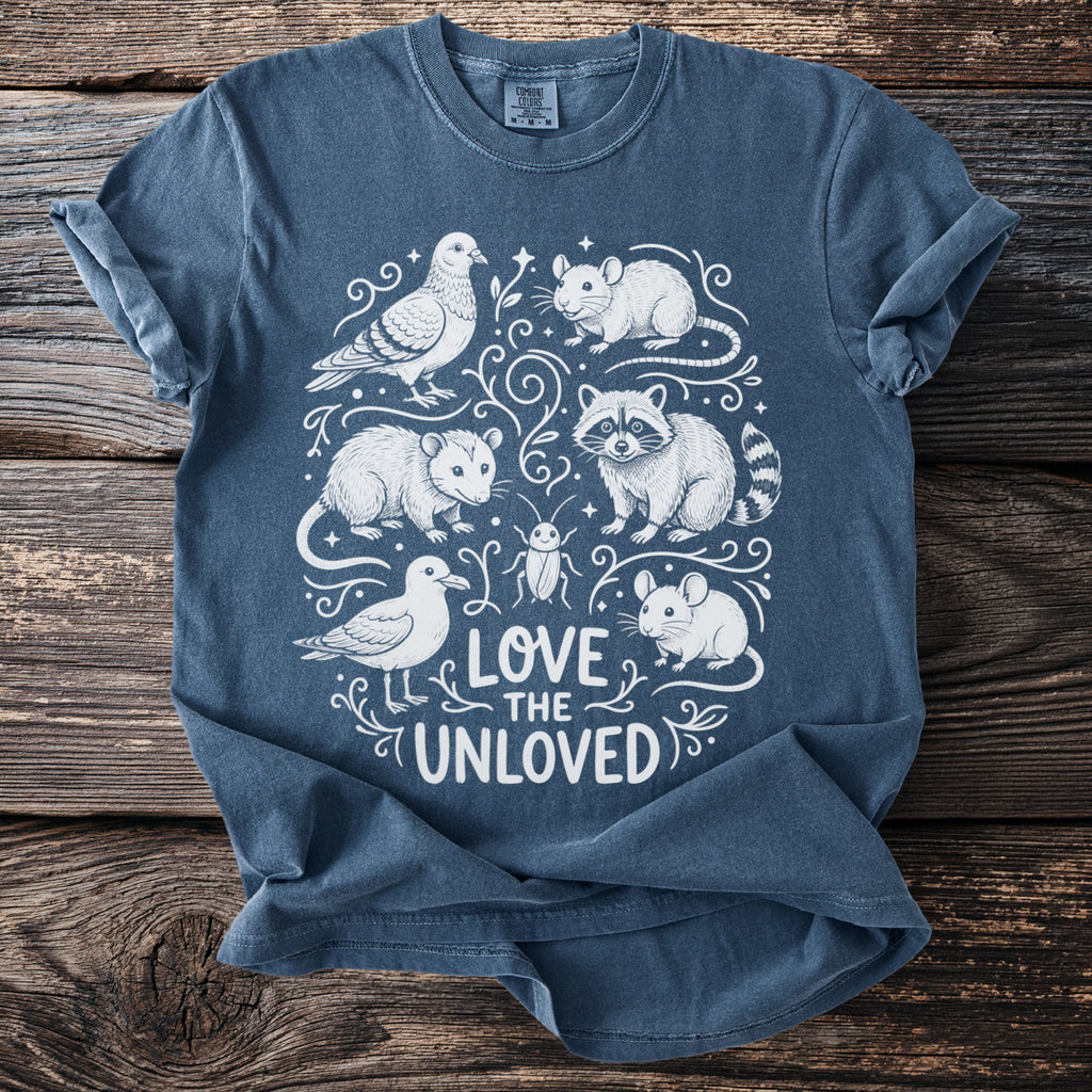 Navy t-shirt with "Love the Unloved" text surrounded by illustrated animals.