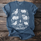 Navy t-shirt with "Love the Unloved" text surrounded by illustrated animals.