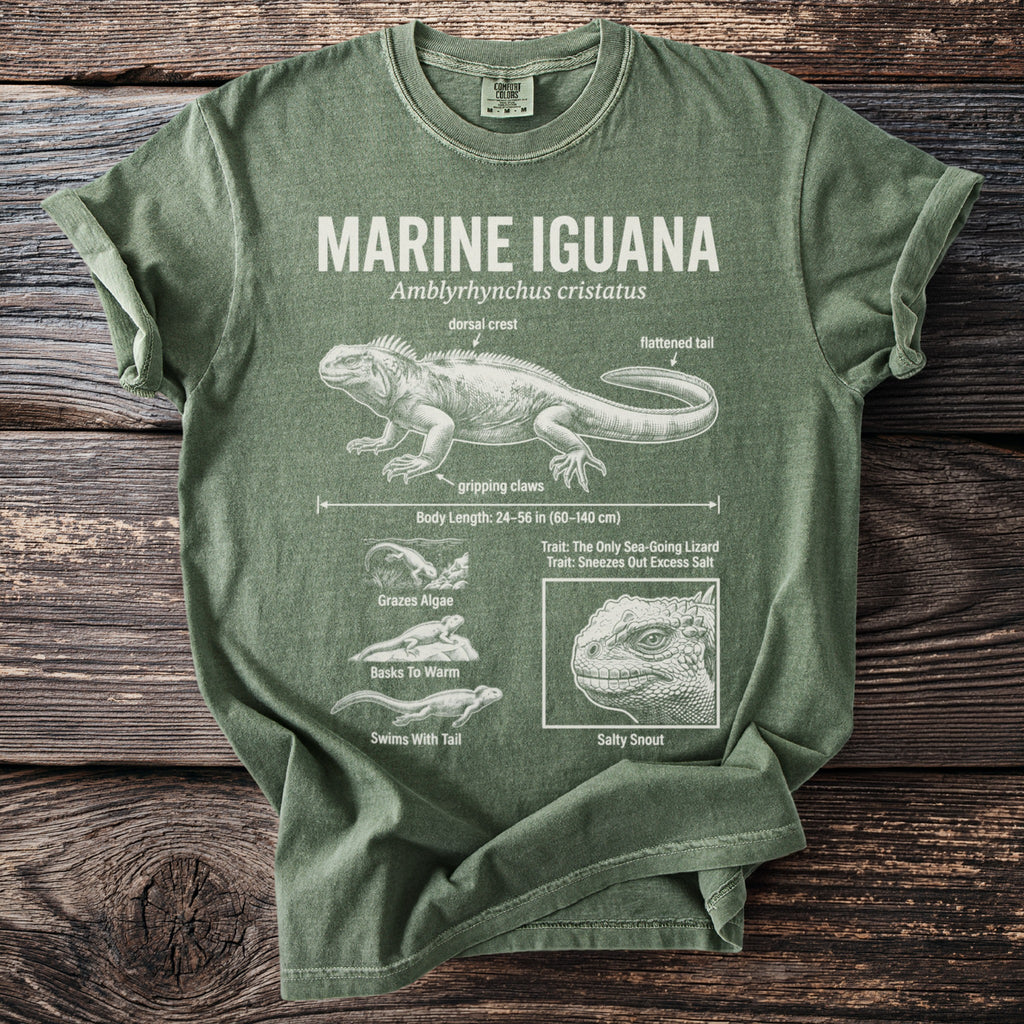 Green t-shirt featuring a detailed illustration of a marine iguana with labels and facts.