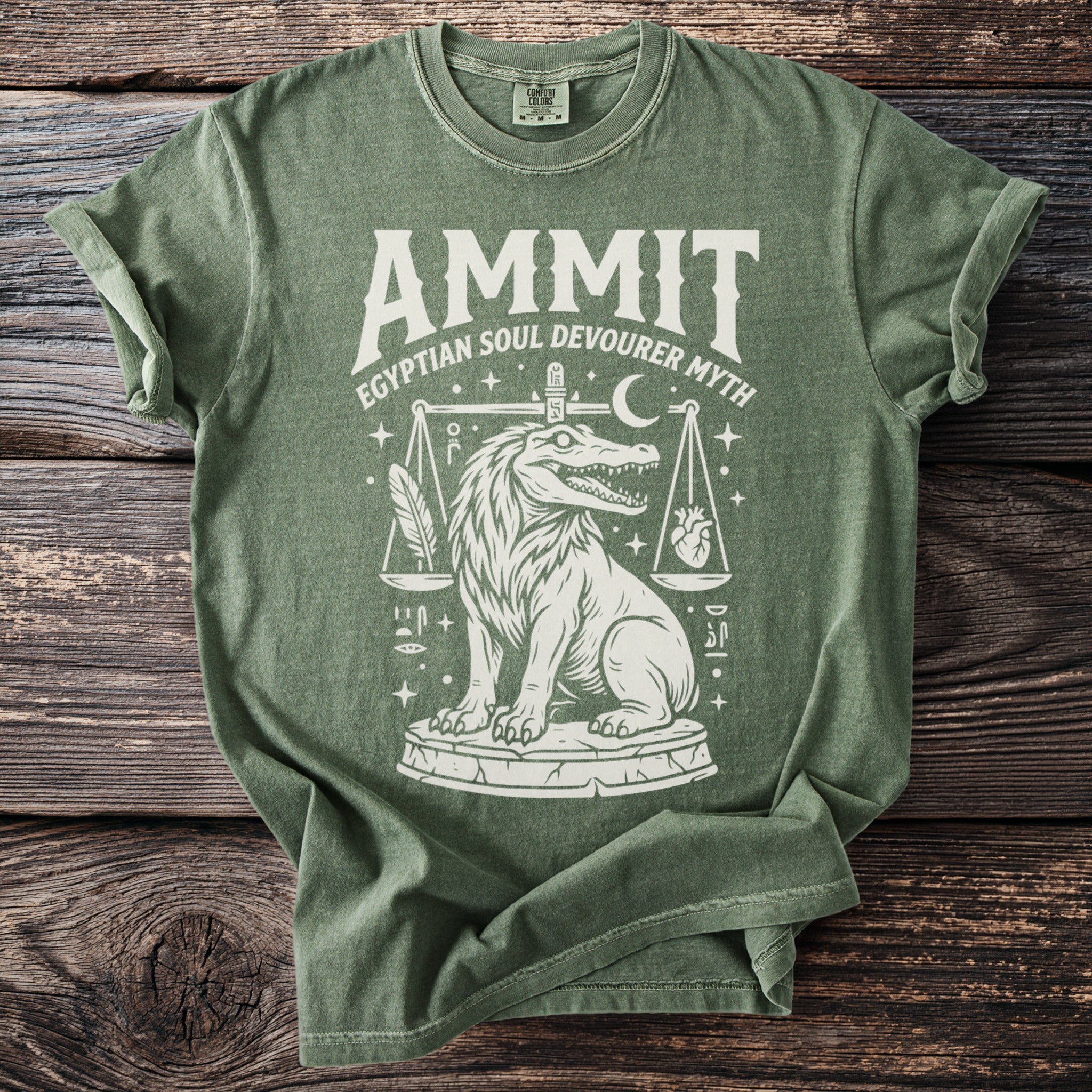 Green t-shirt with "Ammit Egyptian Soul Devourer Myth" graphic of Ammit on scales.