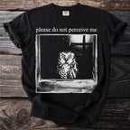 Black t-shirt with an owl graphic and text "please do not perceive me".