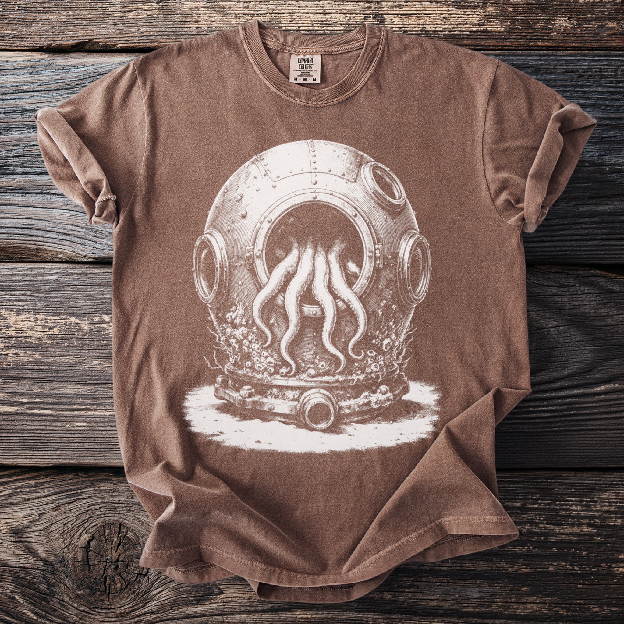 Brown t-shirt with a white print of a vintage diving helmet with octopus tentacles.