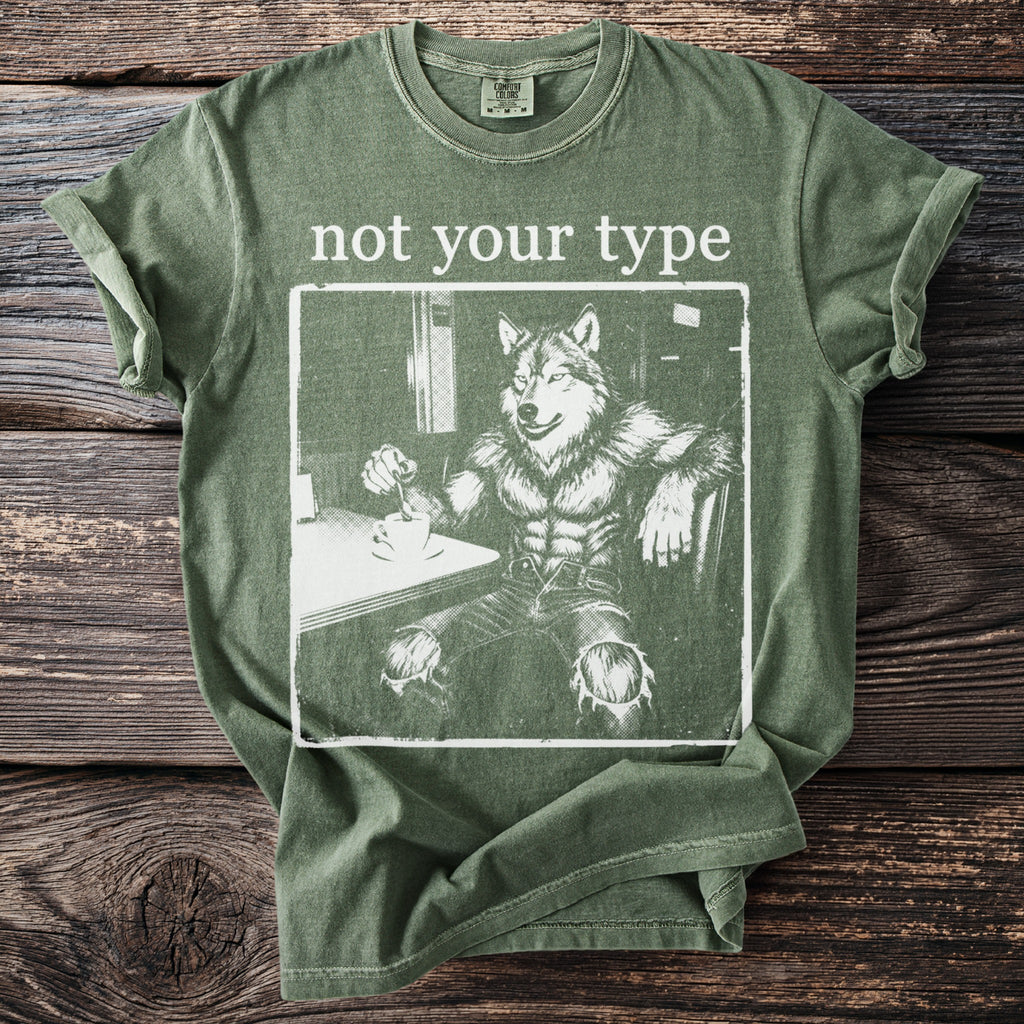 Green t-shirt with "not your type" and a werewolf drinking coffee graphic.