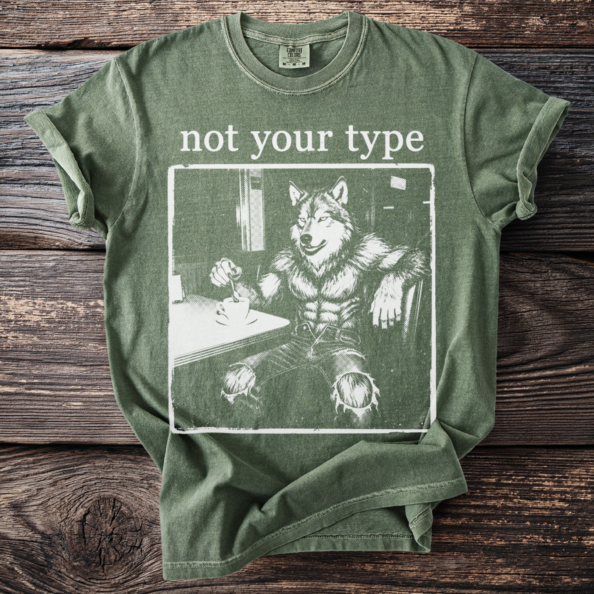Green t-shirt with "not your type" and a werewolf drinking coffee graphic.