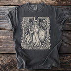 Dark grey t-shirt with a light-colored graphic of a warrior woman with ravens and a moon.